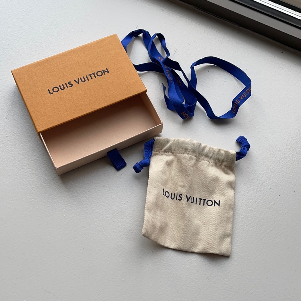 Louis Vuitton Box, Jewelry Bag, and Ribbon